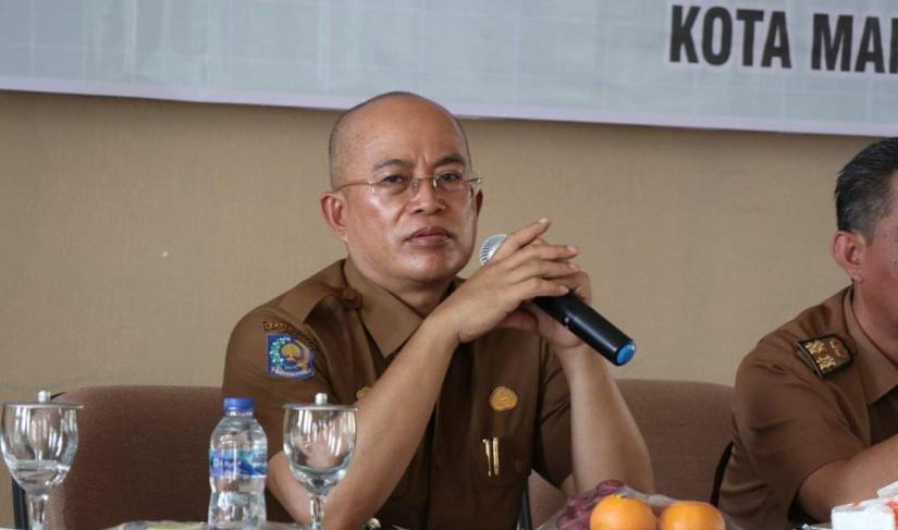 Bupati Gusnan Mulyadi.