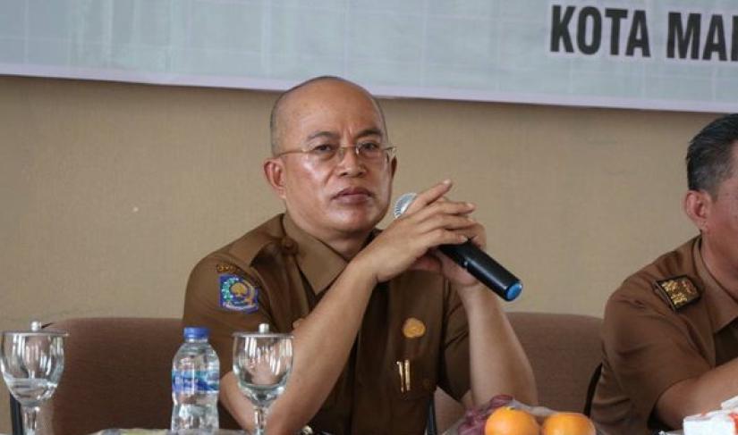 Bupati Gusnan Mulyadi.