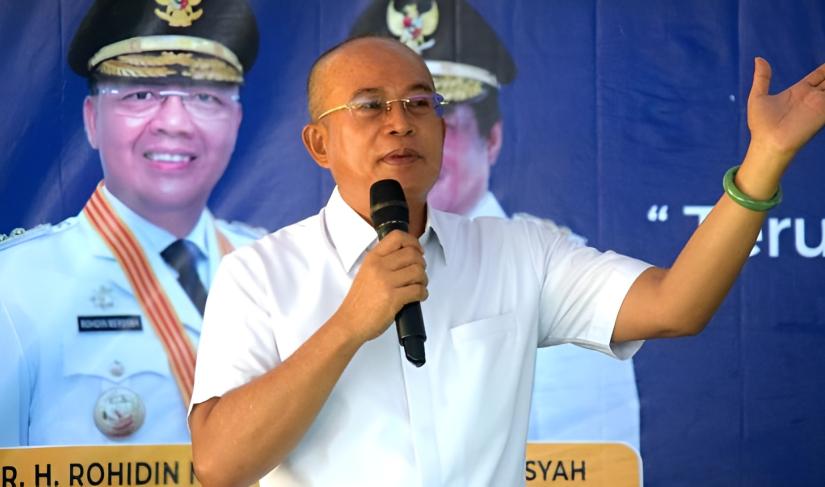Bupati Gusnan Mulyadi.