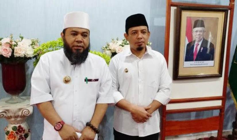 Helmi Hasan dan Dedy Wahyudi 
