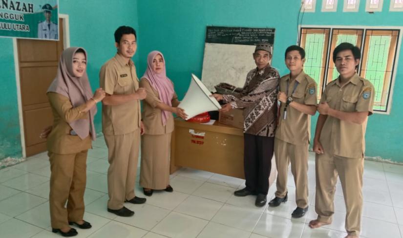 Pelatihan ilmu tajwid serta penyerahan alat penunjang guru TPQ desa talang pungguk 