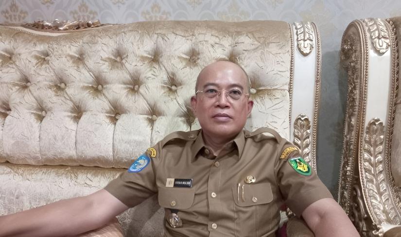 Bupati Gusnan Mulyadi.
