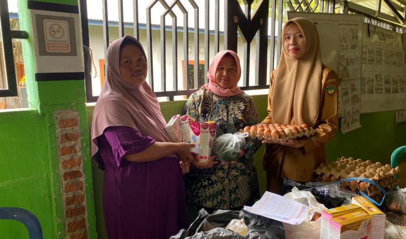 Kegiatan Posyandu dan PMT Desa Ganjuh/ist