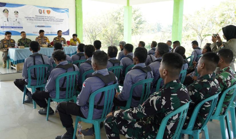 Salah satunya melalui kegiatan Peningkatan Kapasitas Satuan Perlindungan Masyarakat (Satlinmas) yang digelar di Balai Desa Kesongo, Kecamatan Kedungadem, Jumat (17/7/2026).