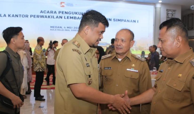 Gubernur Sumut Muhammad Bobby Afif Nasution mengukuhkan Kepala Kantor Perwakilan LPS I Wilayah Sumut, Senin 4/5/2026 .