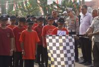 Asisten III Setdakab BU, Dr. Agus Haryanto SE, MM membuka kegiatan perlombaan 