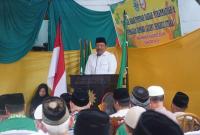 Bupati BU, saat menyampaikan kata sambutan di gedung Muhammadiyah BU