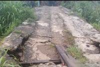 Poto kondisi Sayap Abotmen Jembatan Desa Sinar Pagi yang ambruk akibat Lebatnya Curah hujan
